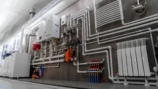ТОВ ТЕПЛОТЕП, 42 С магазин - склад, котли, радіатори — фото